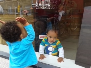 Michael & Leon playing in the window